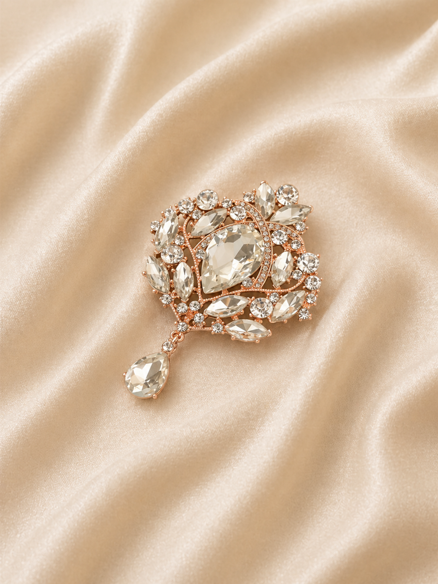 structured brooch with symmetrical stone layout