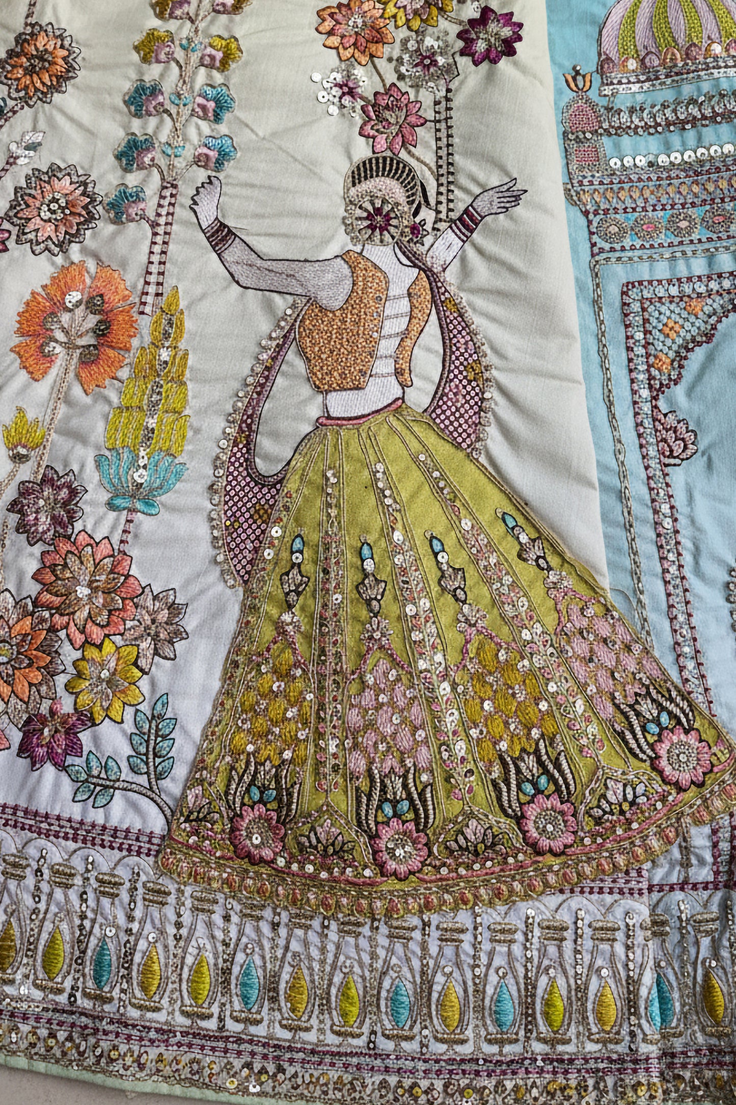 Detailed shot of lace border on lehenga hemline