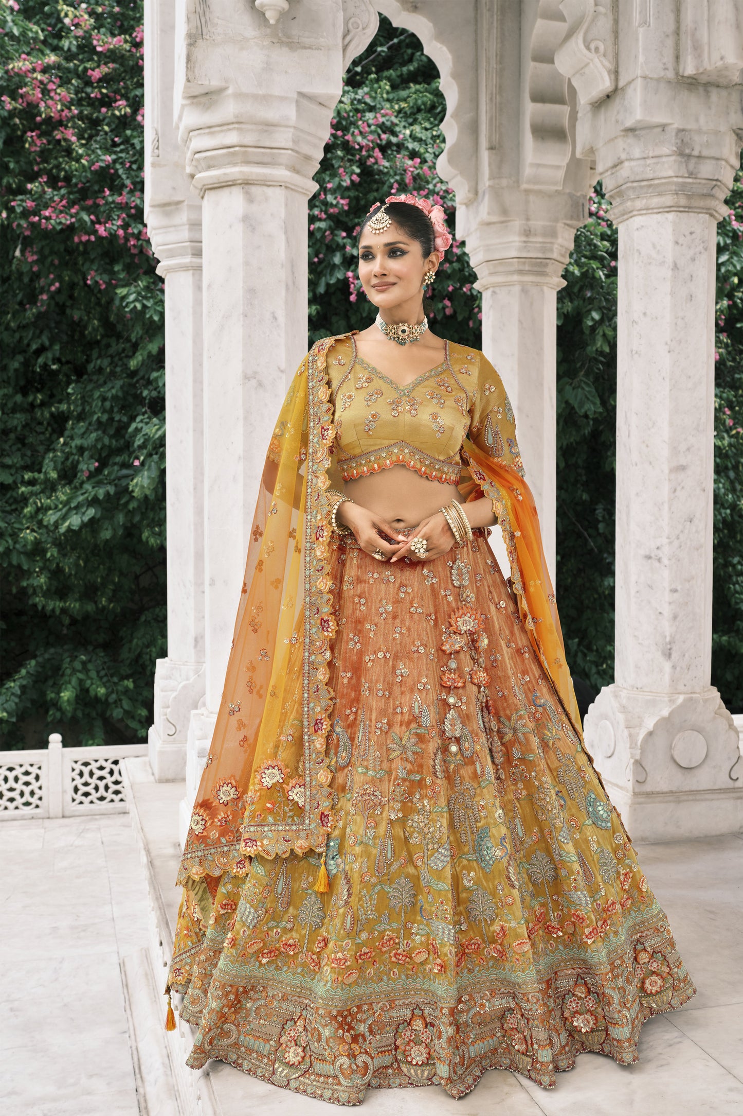 Fancy silk orange lehenga for wedding reception
