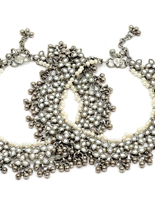 women wearing designer anklet set