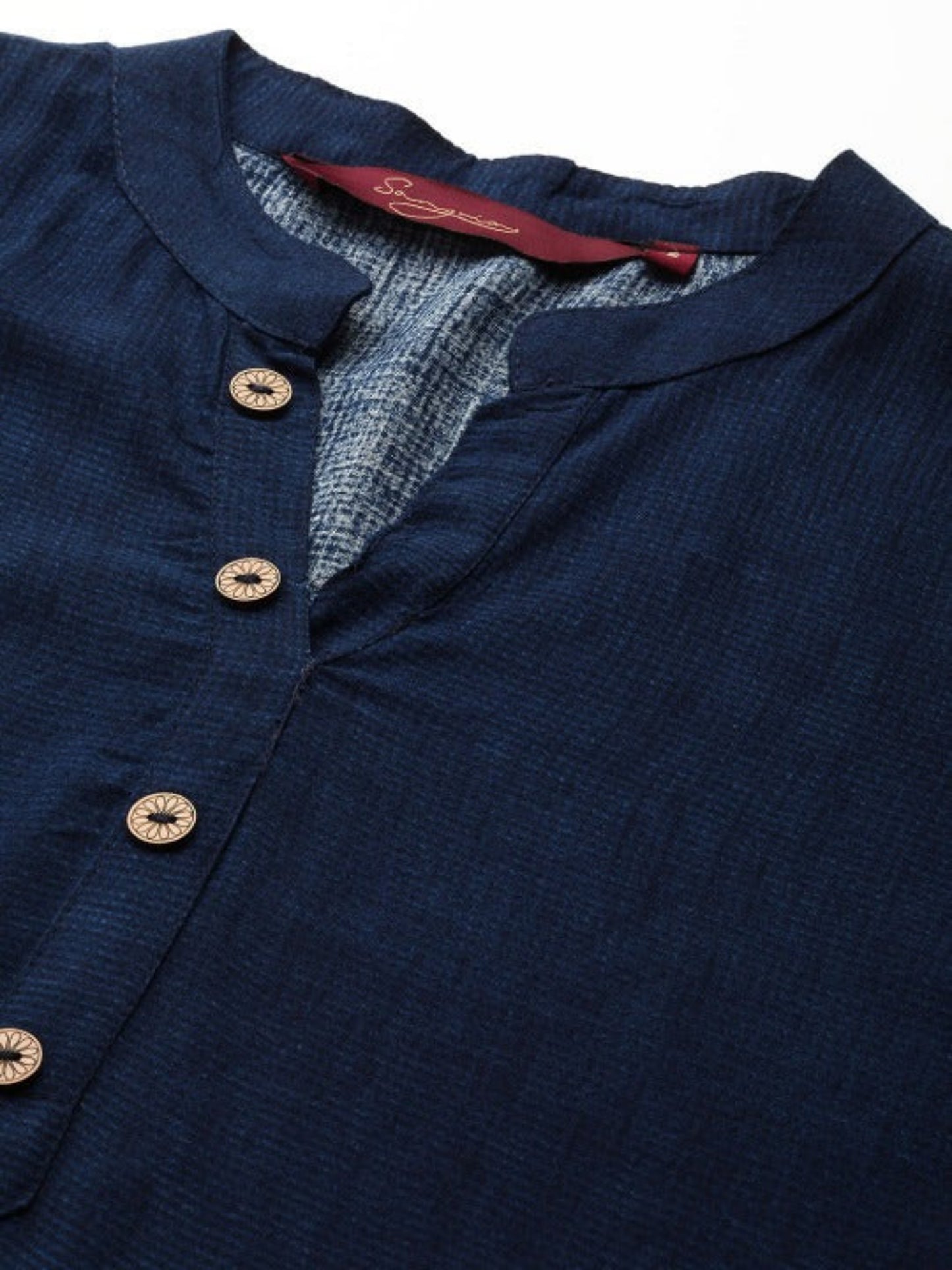 close-up of printed surface on navy tunic top