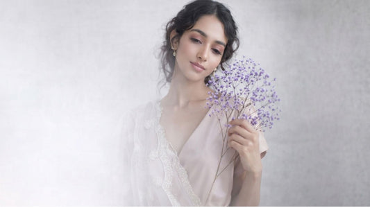 Luxury ivory lehenga for women UK with delicate embroidery, pastel bridal outfit, elegant Indian wedding wear UK, designer lehenga photoshoot