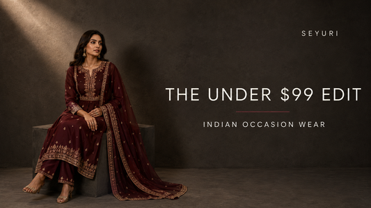 Seyuri Indian Dresses Under $99 blog cover featuring a model in a wine-red embroidered Anarkali dress with a flowing dupatta.