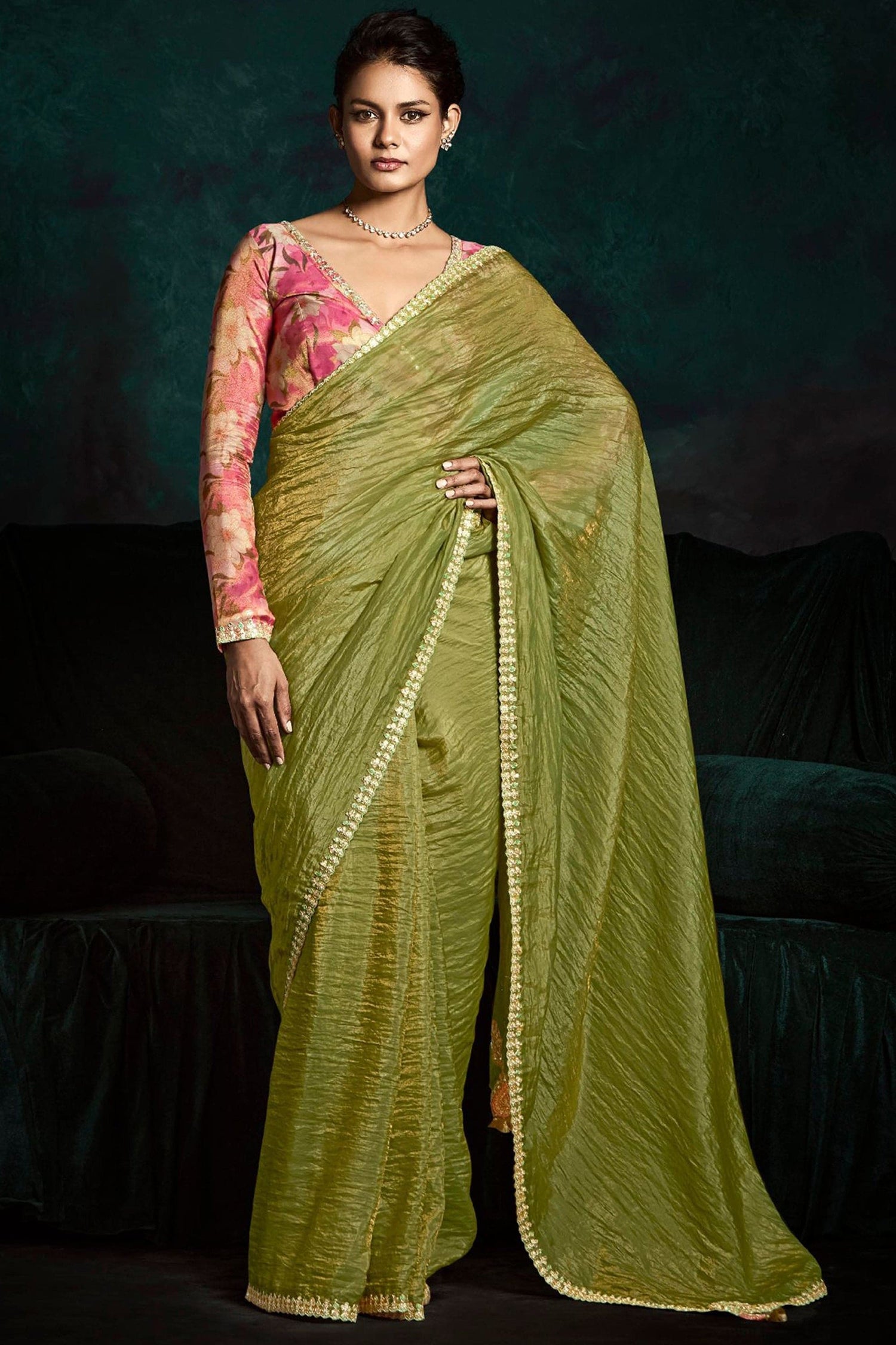 Green Saree symbolizes freshness and festivity – great for Mehndi or family gatherings.