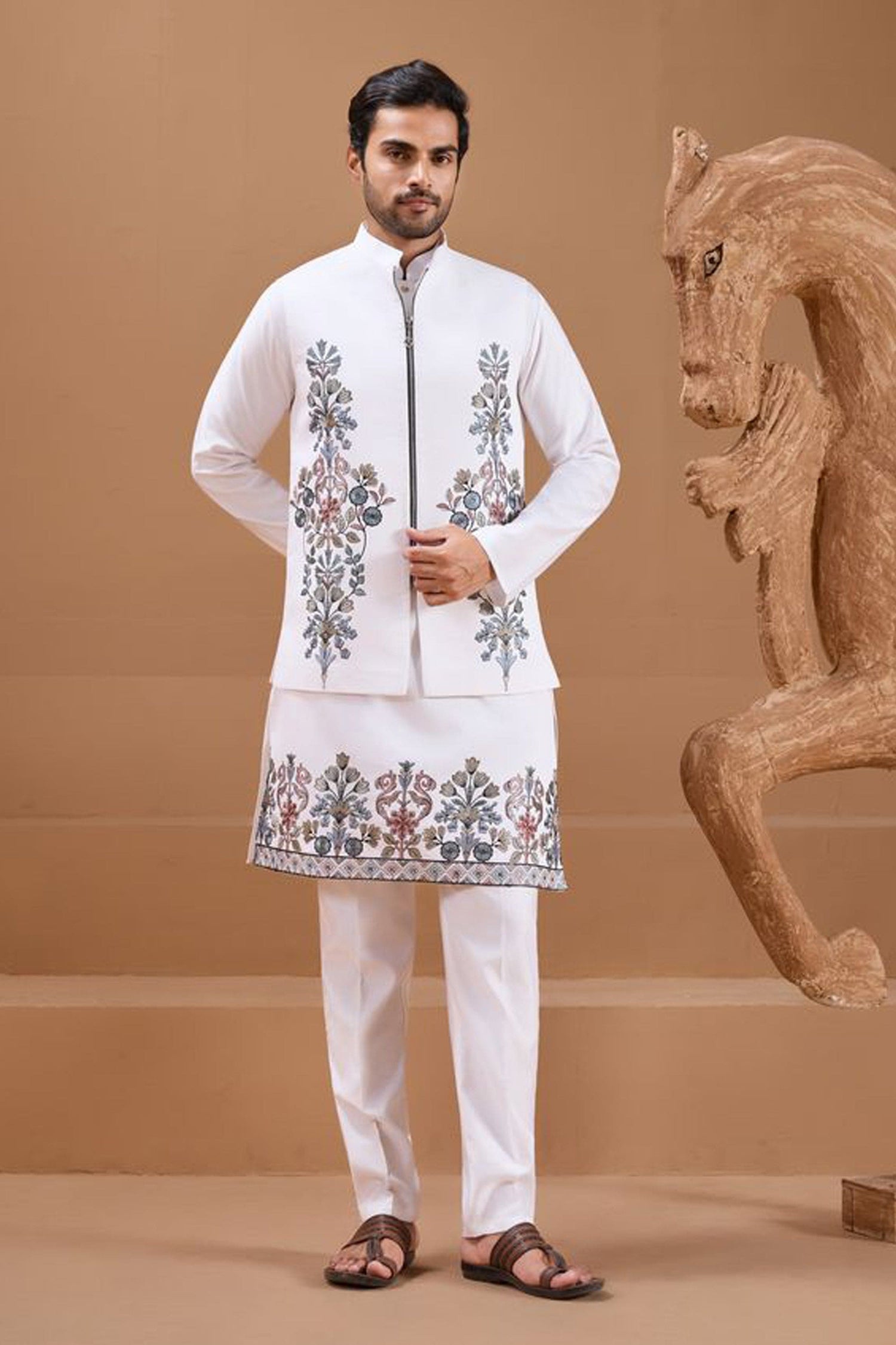 white kurta pajama with embroidered detailing