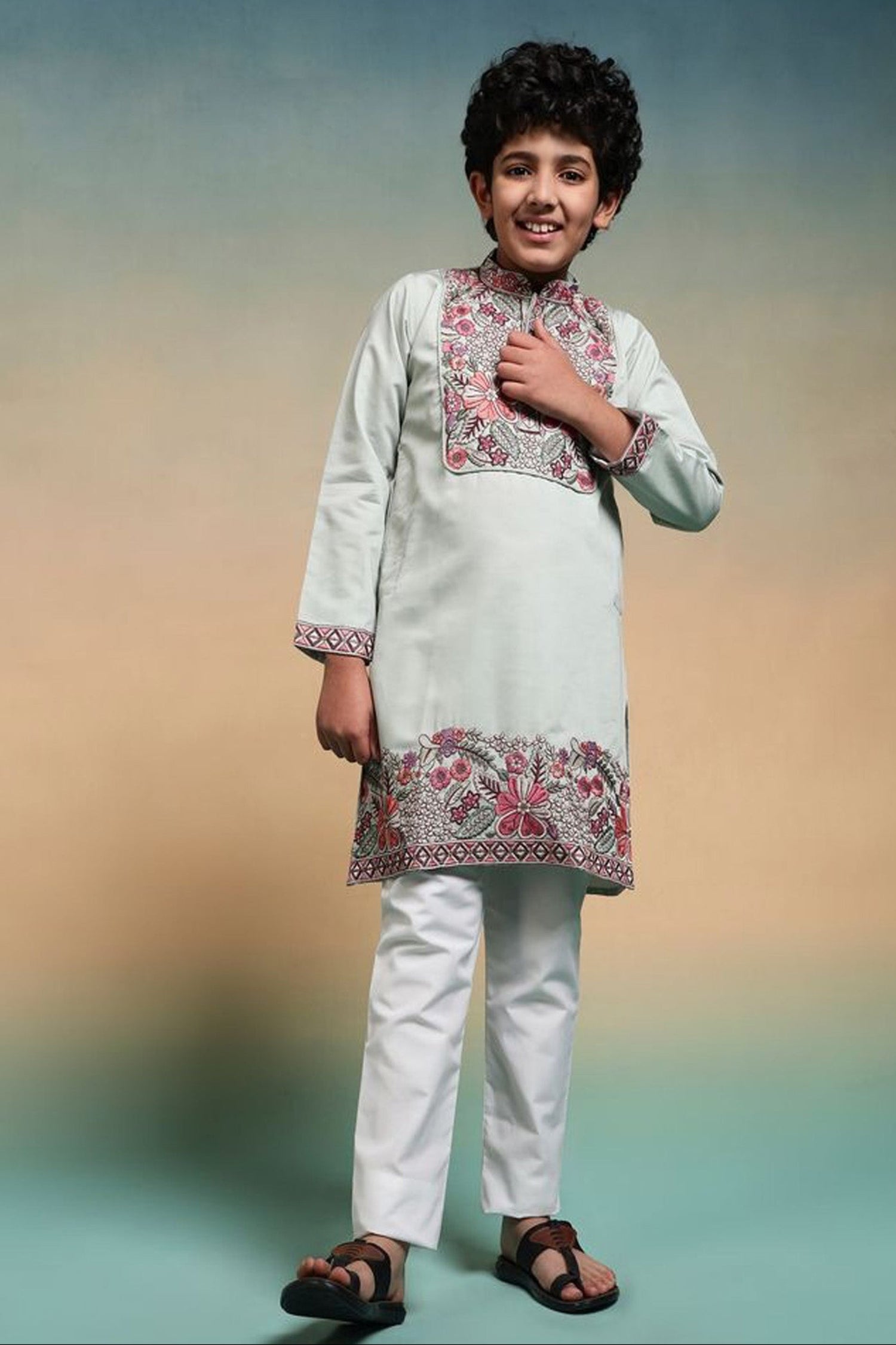 Pistachio green kurta set for boys with embroidered detail