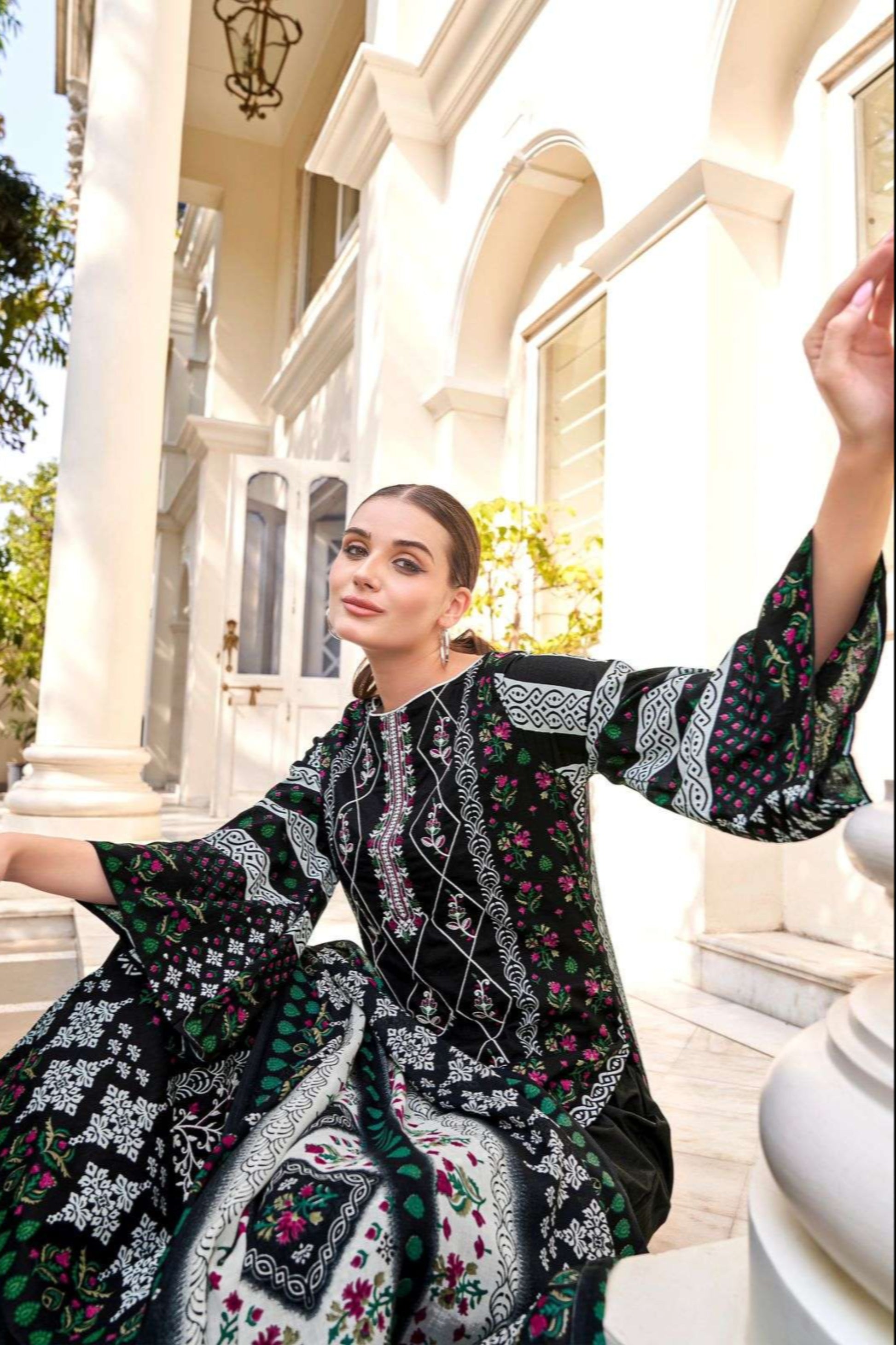 Sleeve detail of black cotton casual dress