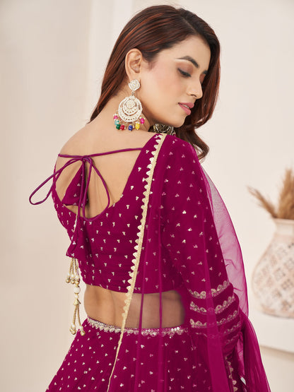 Dark pink bridal lehenga with sequins and net dupatta in Florida.