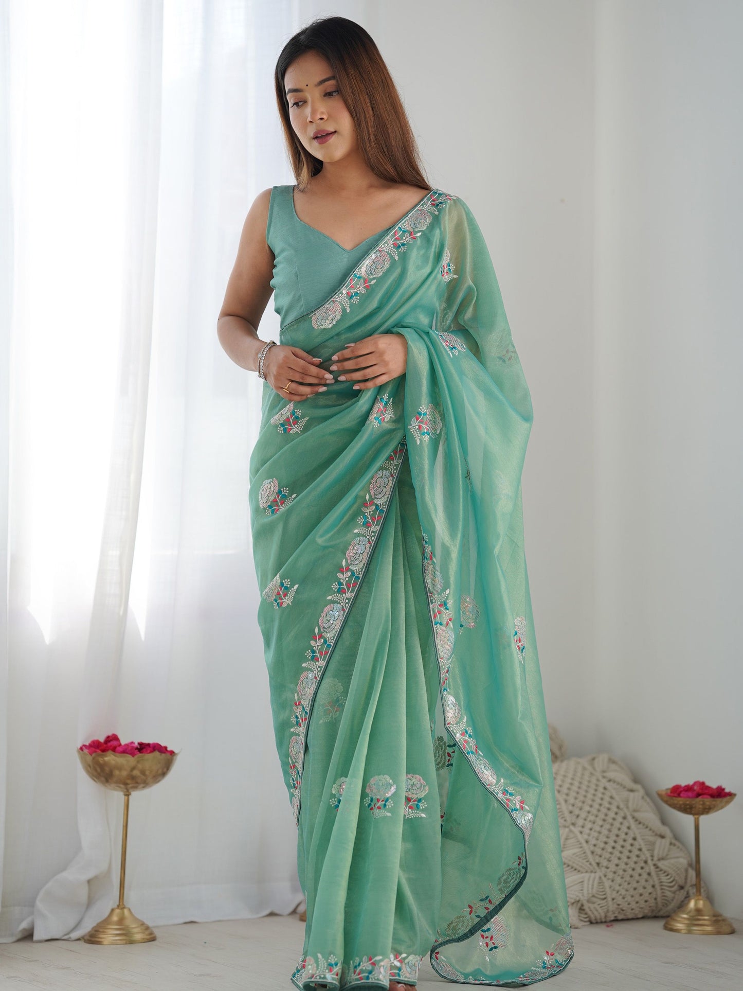 Pastel Green Saree symbolizes freshness and festivity – great for Mehndi or family gatherings.

