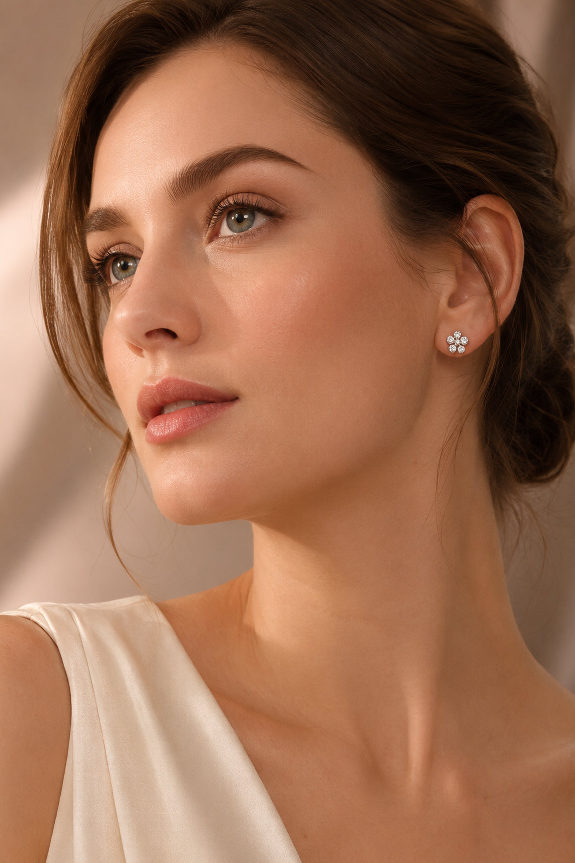 Small hoop earrings with clear light-catching accents
