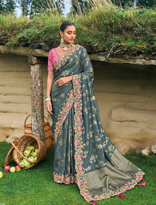 Stunning grey dola silk saree with embroidery—ideal for weddings.