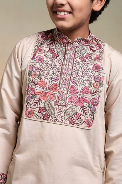 Close-up of thread and sequence embroidered work on Beige kurta