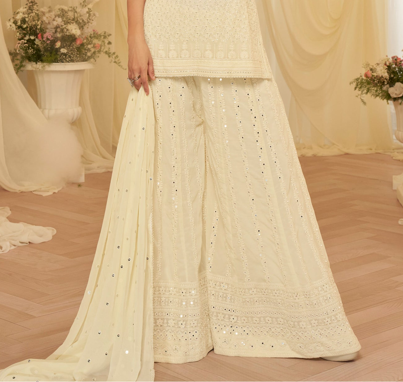 Elegant cream salwar kameez suits for wedding guest look