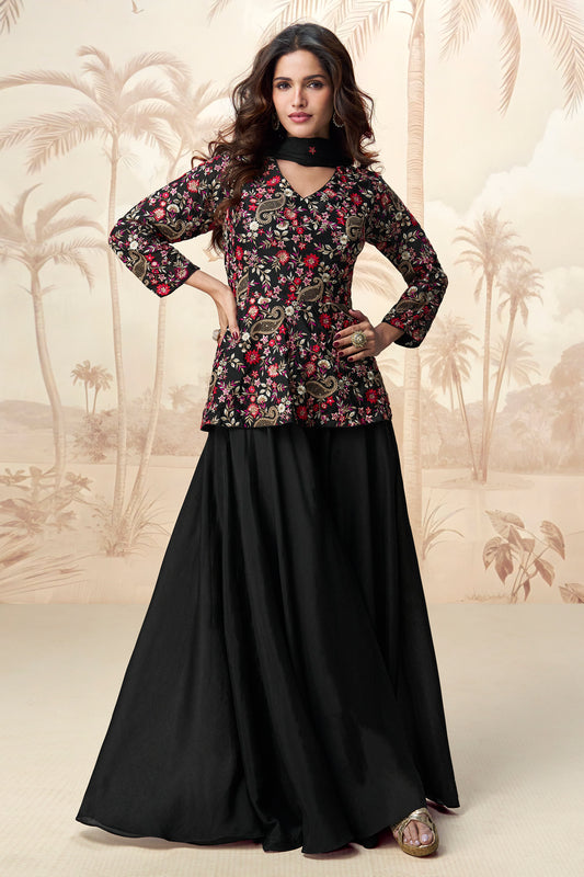 Classic black palazzo outfit with a stylish look, perfect for evening events and festive occasions.
