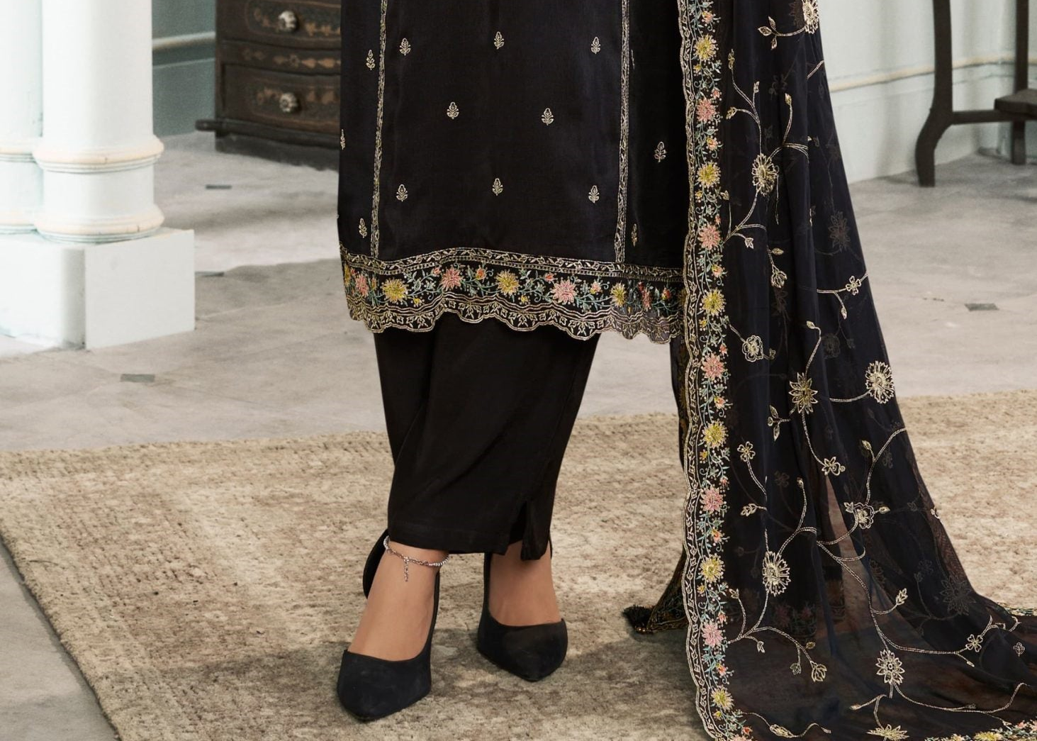 Black Embroidered Salwar Set Paired With Soft Organza Dupatta, Perfect For Weddings And Celebrations.