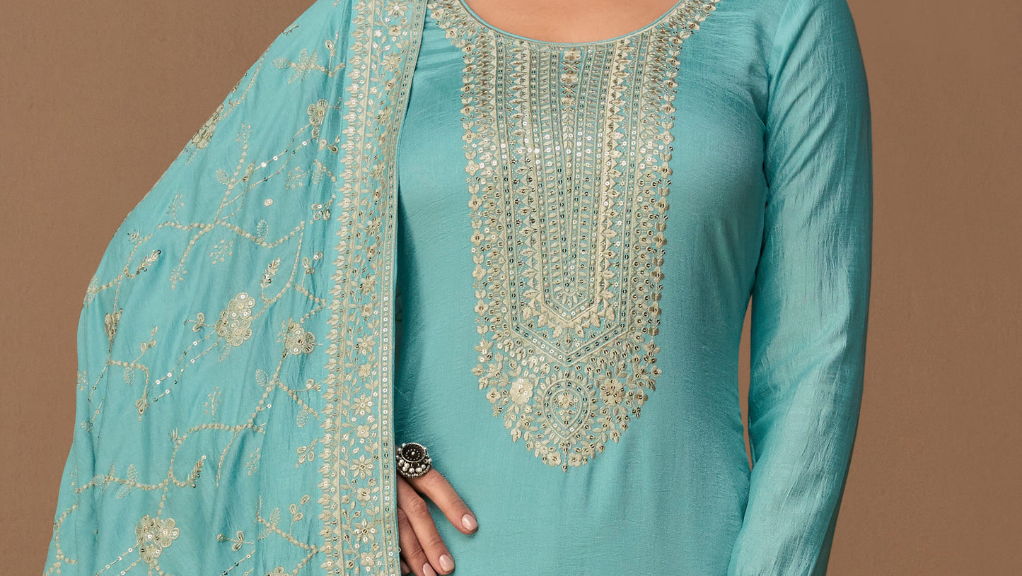 Embroidery work close-up on cyan blue salwar kameez