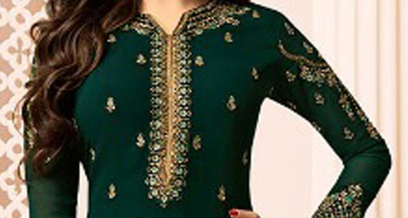 A dark green long-sleeve kurta with intricate gold embroidery on the neckline, front placket, and sleeves, shown on a model.