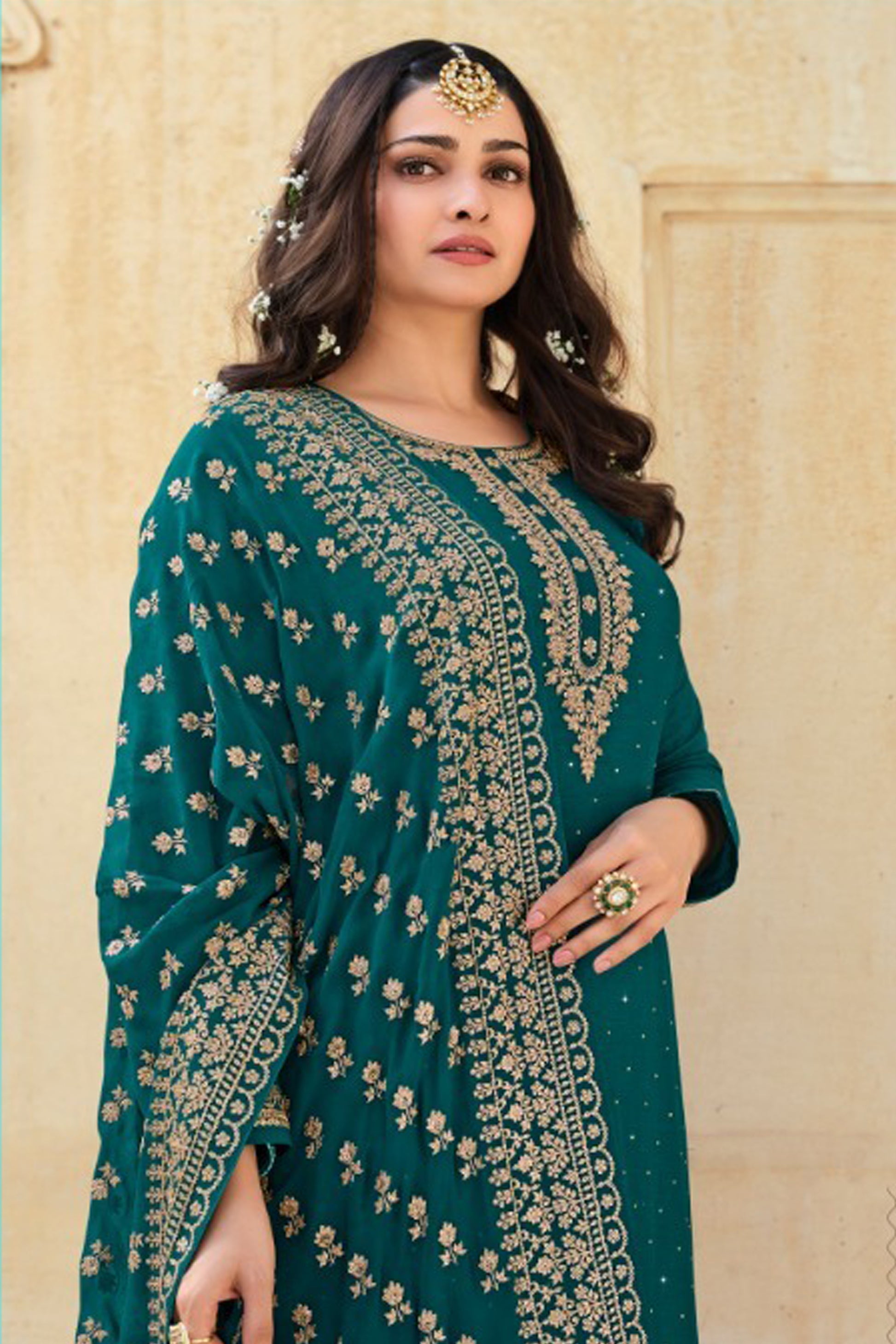 dark green salwar kameez embroidery detail close up