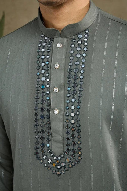 Detailed close-up of kurta pajama fabric and traditional ethnic accents