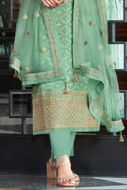 Heavy embroidery work on pistachio green salwar kameez fabric