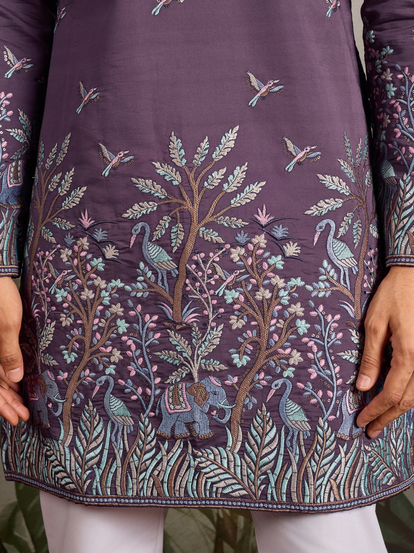 Men's blue kurta pajama styled for traditional wedding wear