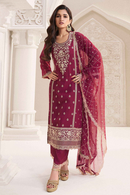 Red salwar kameez suit with embroidered kameez front view