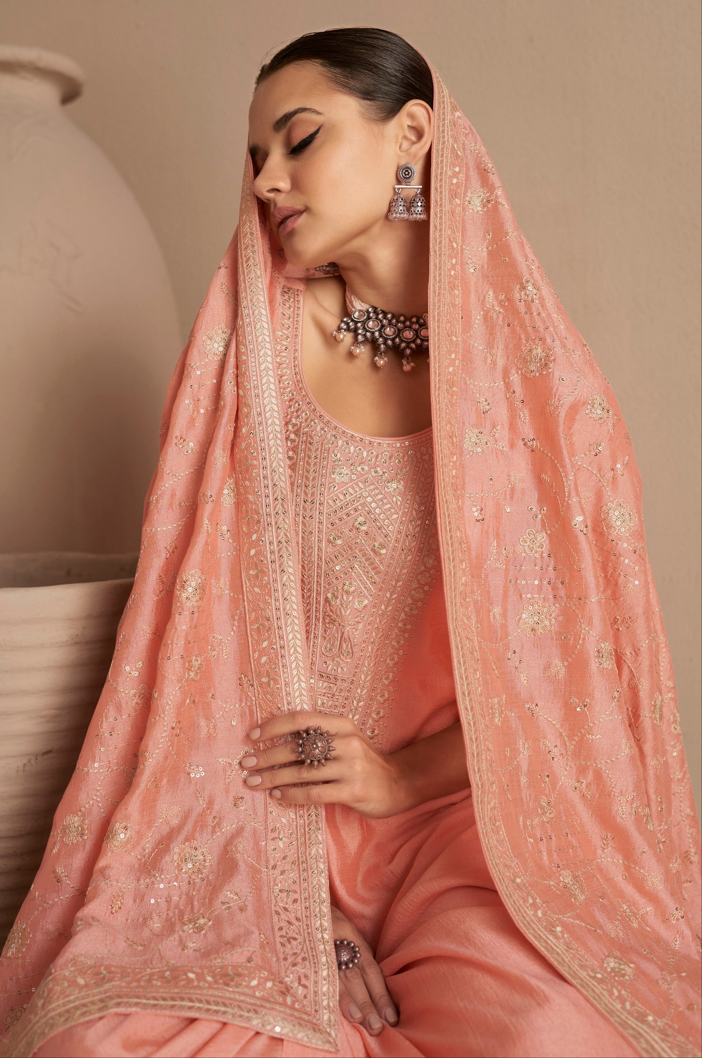 Premium silk fabric texture of peach salwar kameez
