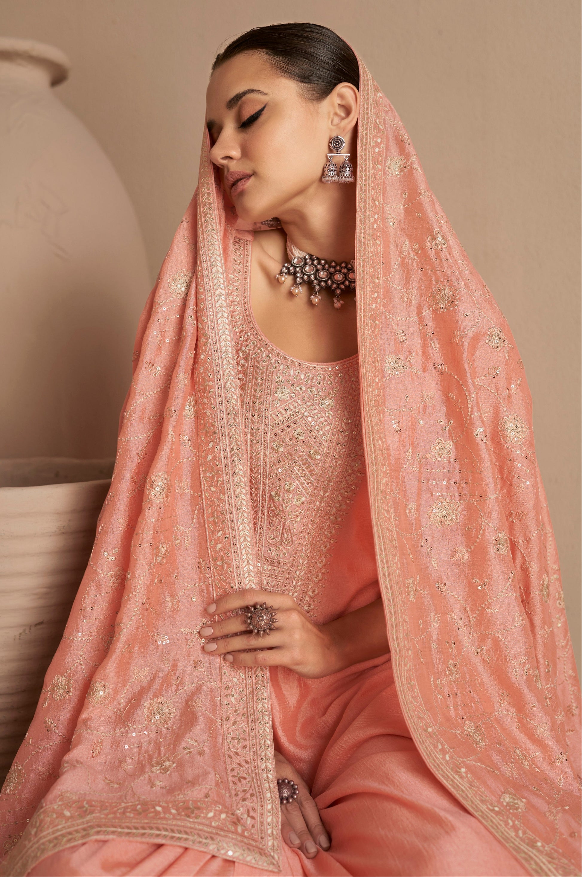 Premium silk fabric texture of peach salwar kameez