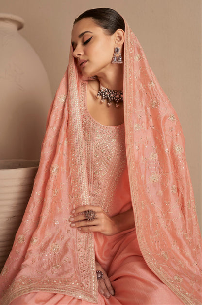 Premium silk fabric texture of peach salwar kameez