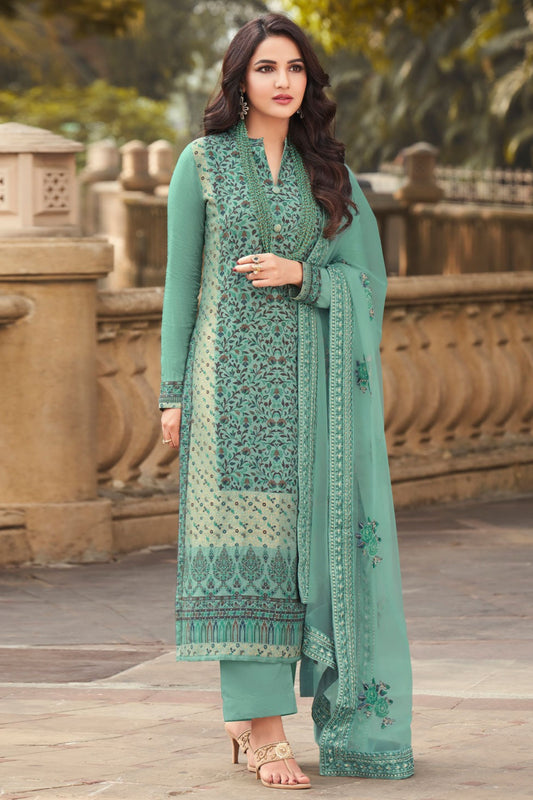 green salwar kameez close-up embroidery detail top fabric