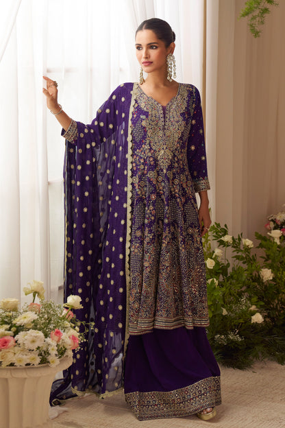 Woman in a traditional purple and gold outfit idel for wedding, festival
