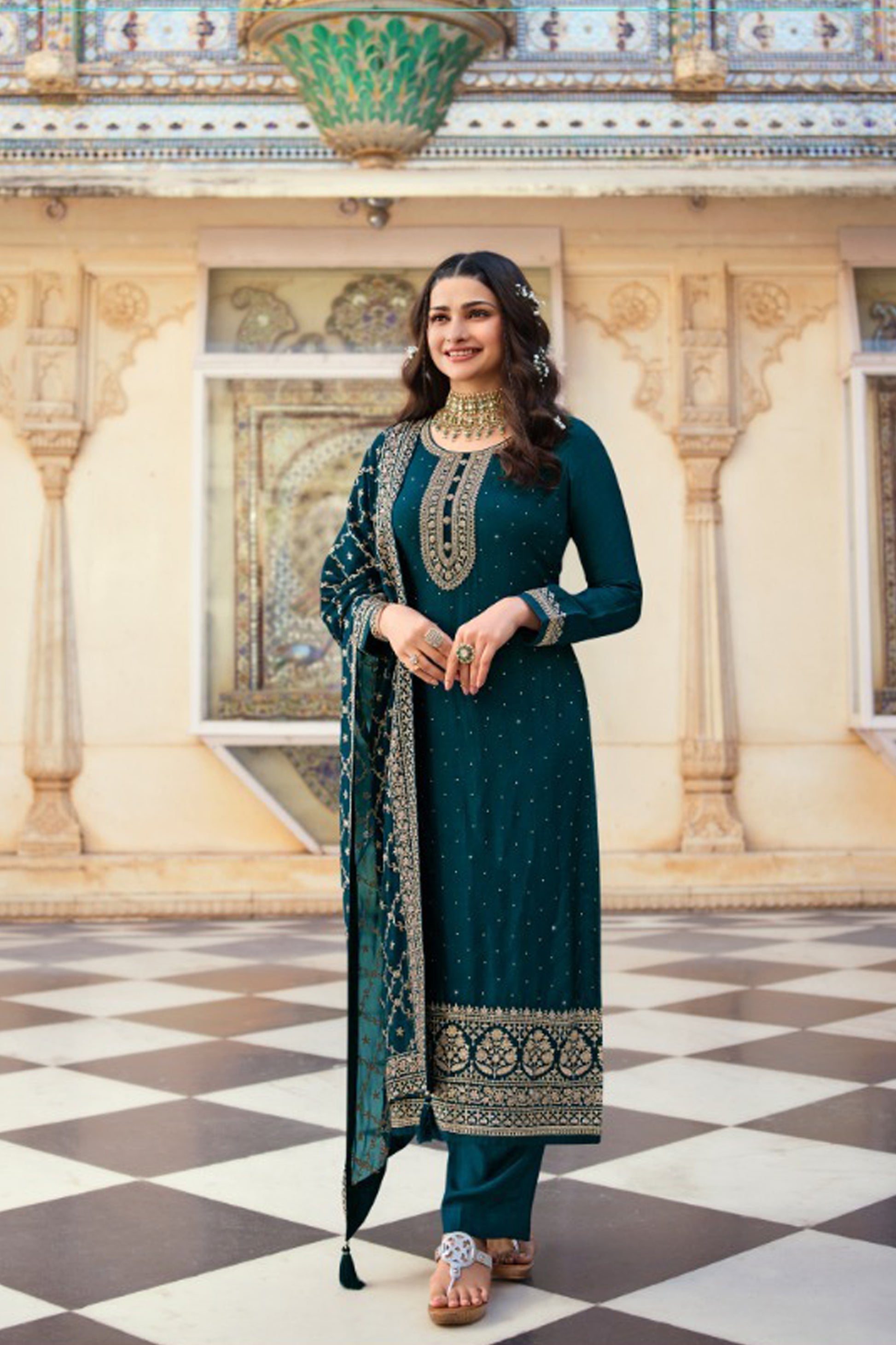Teal green pant kameez front view embroidery detail