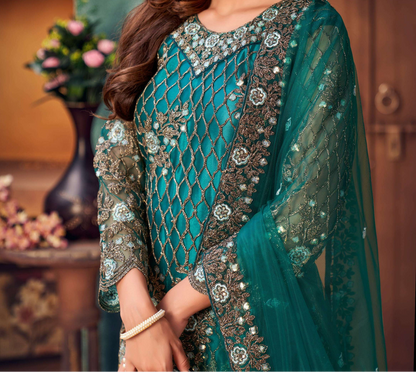 Teal dupatta draped over shoulder with embroidery
