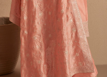 Side angle view of peach salwar kameez drape