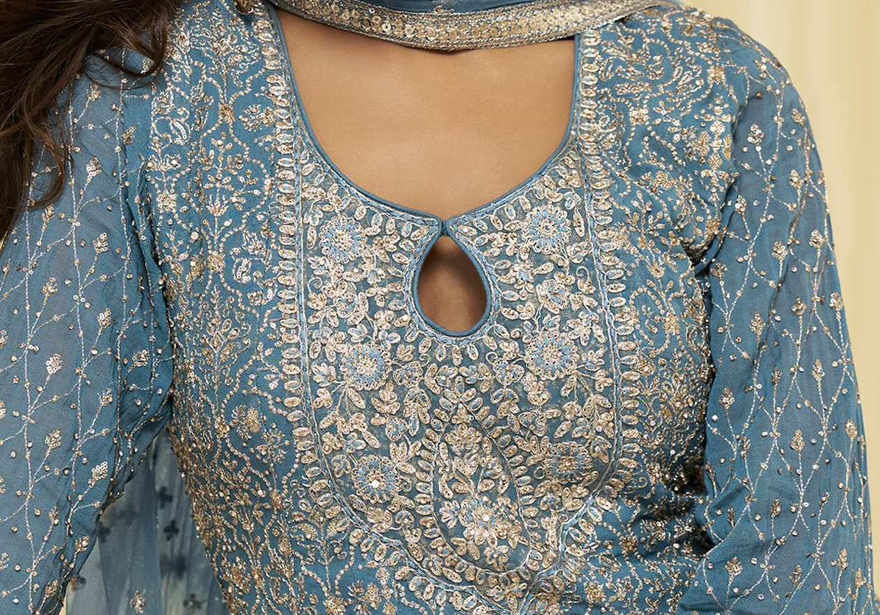 Close-up of seroski zarkan embroidery on neckline