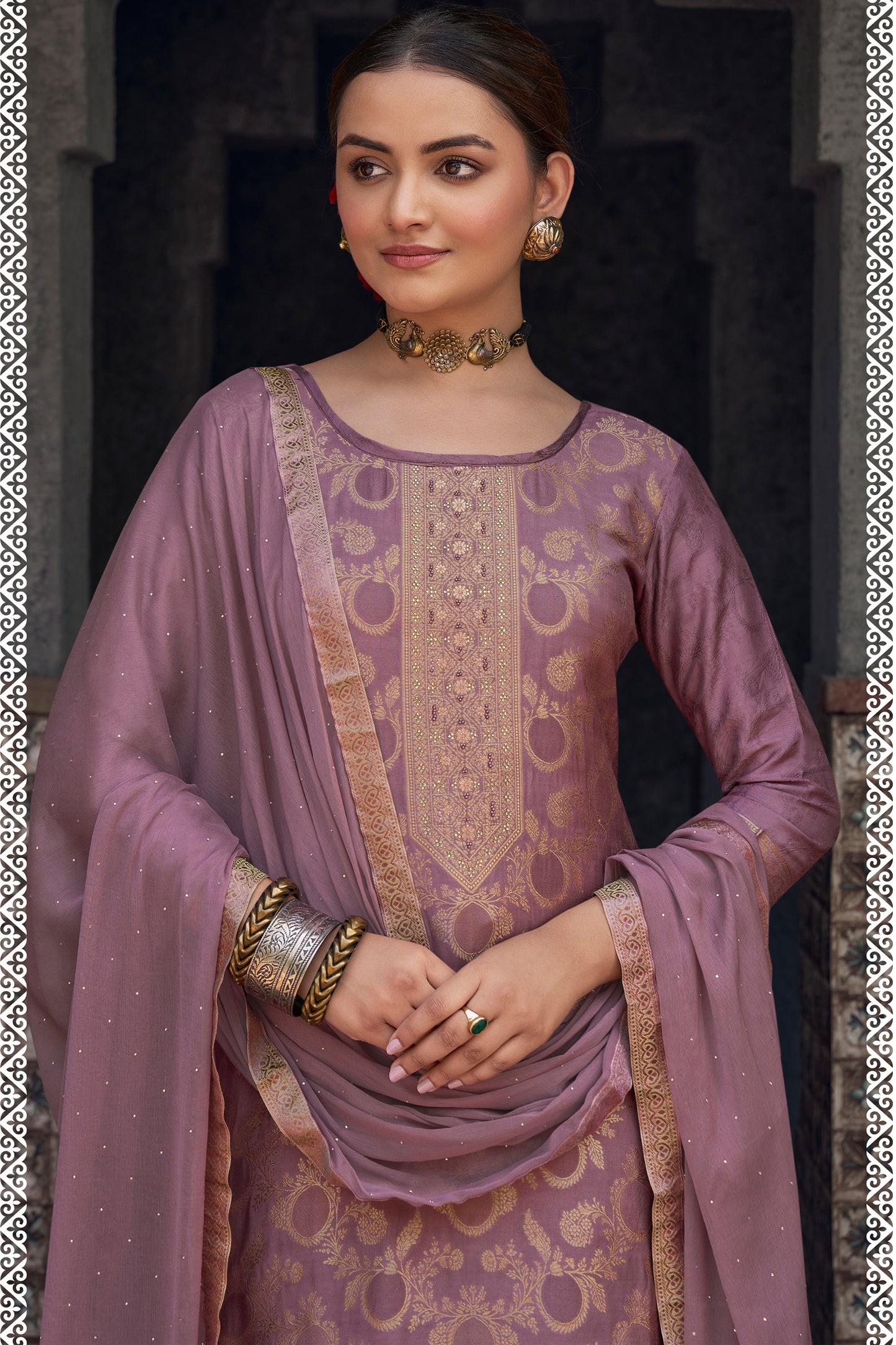 Muslin jacquard salwar kameez with hand work detailing