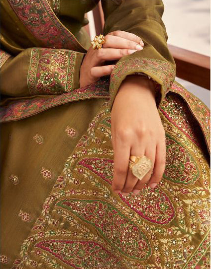 Woman wearing a traditional outfit with a patterned shalwar kameez USA wear.