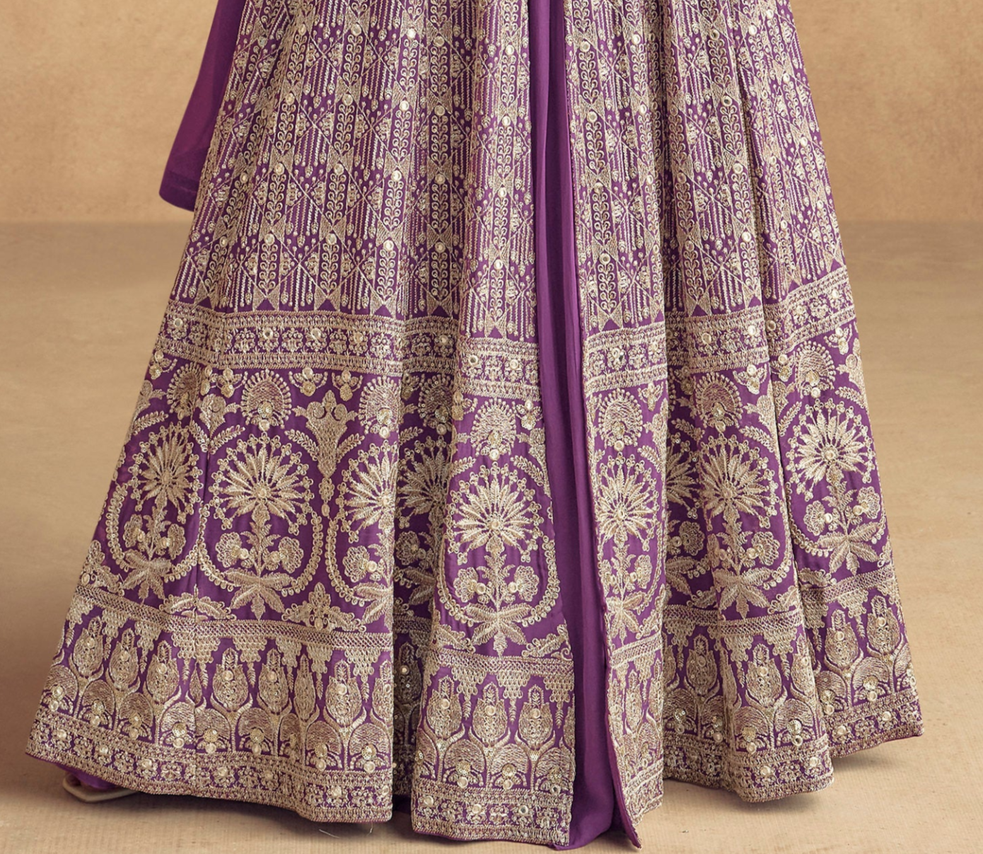  purple and beige embroidered traditional skirt with intricate metallic patterns and a matching purple inner lining.