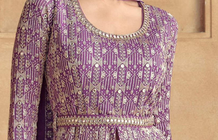 purple and gold patterned traditional embroidered dress