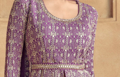 purple and gold patterned traditional embroidered dress