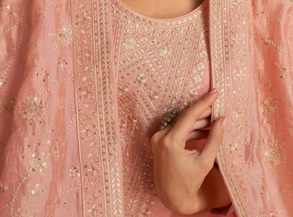 Back view of peach kameez shalwar with refined finish
