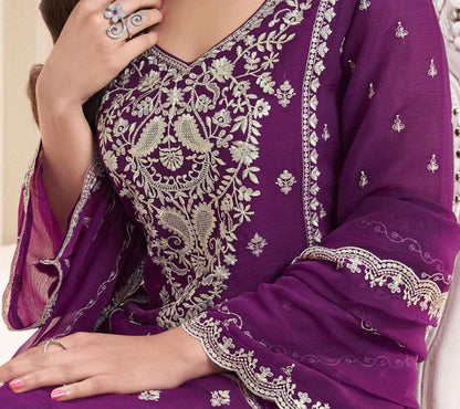 Close Up Of Embroidery On Purple Salwar Kameez