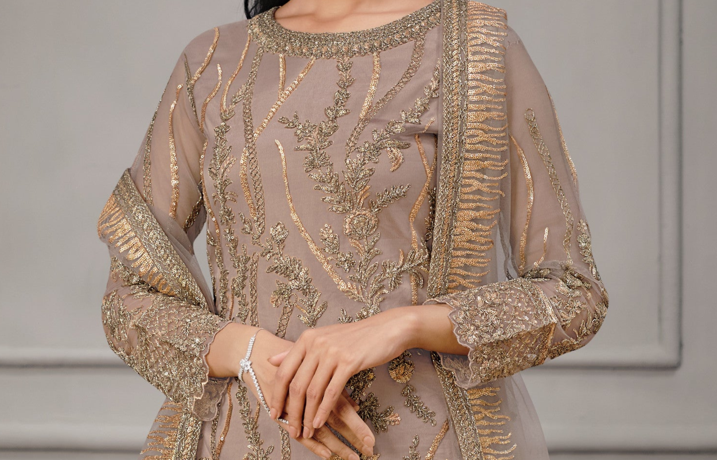 Brown salwar kameez gives a warm, grounded, and earthy feel