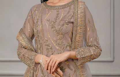 Brown salwar kameez gives a warm, grounded, and earthy feel