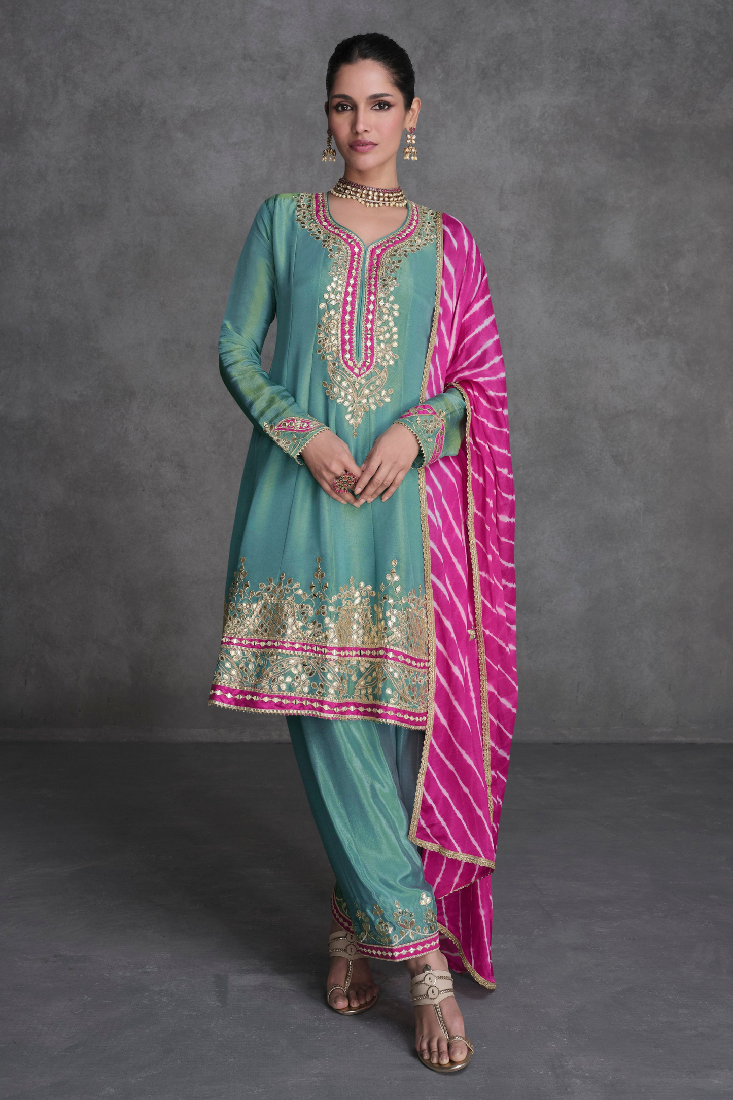 Detailed embroidery and sequins work on kameez neckline
