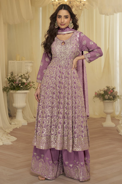 Pink festive palazzo outfit under evening lighting