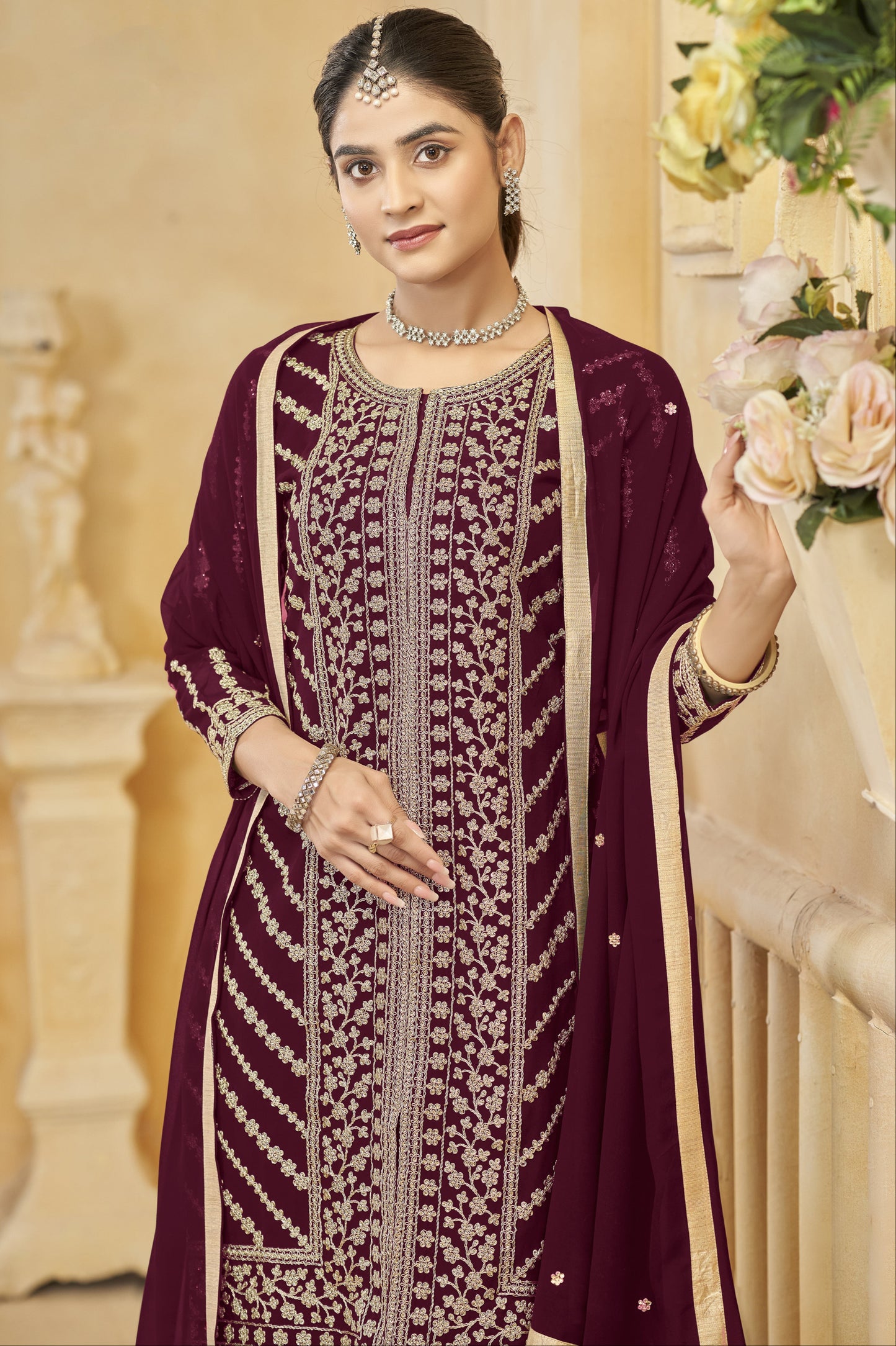 A wine-colored salwar kameez exudes elegance and sophistication
