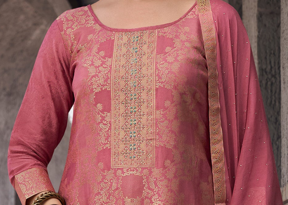 Hand work detailing on peach kameez close-up