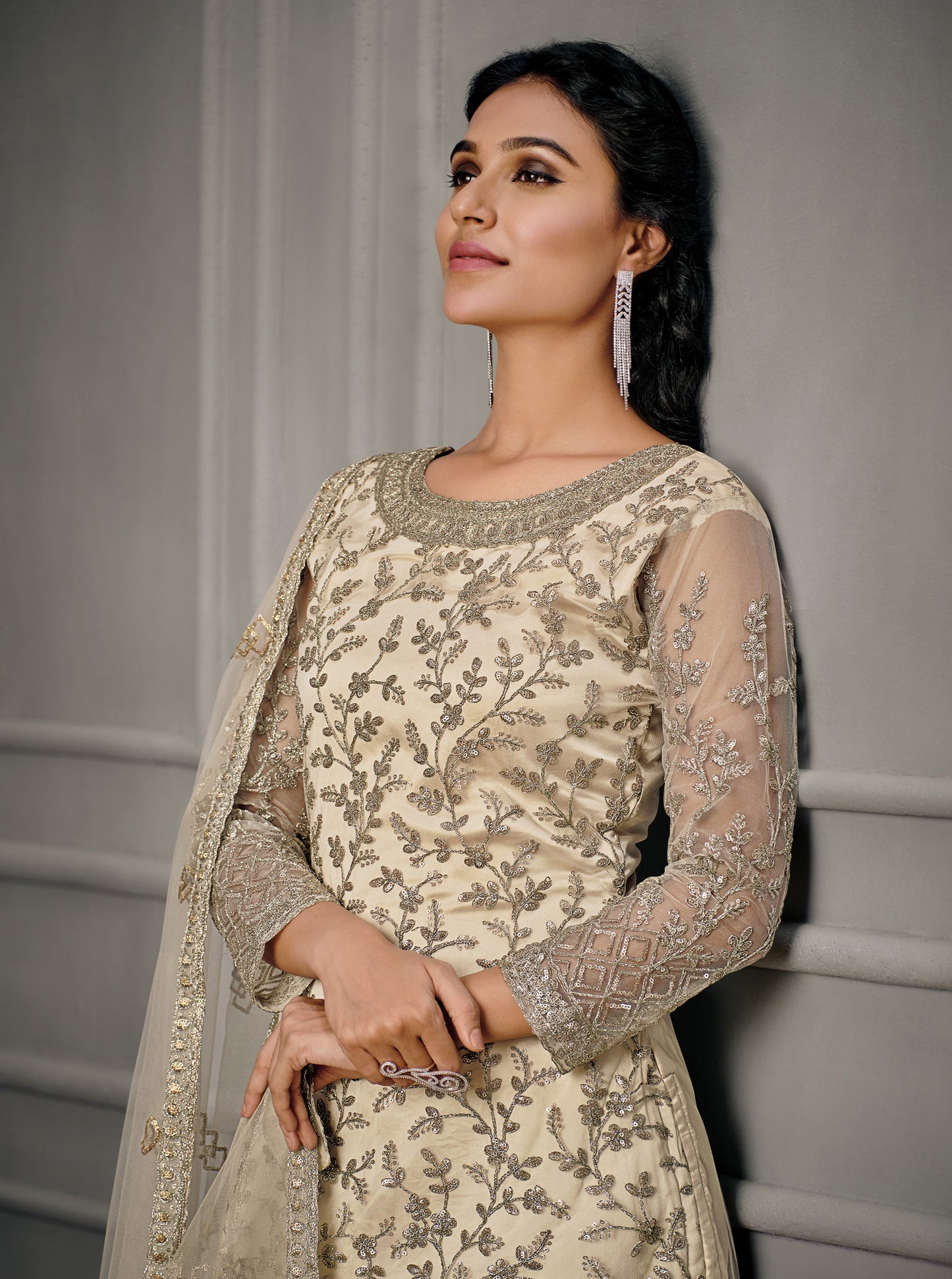 embroidery detail on off-white salwar kameez