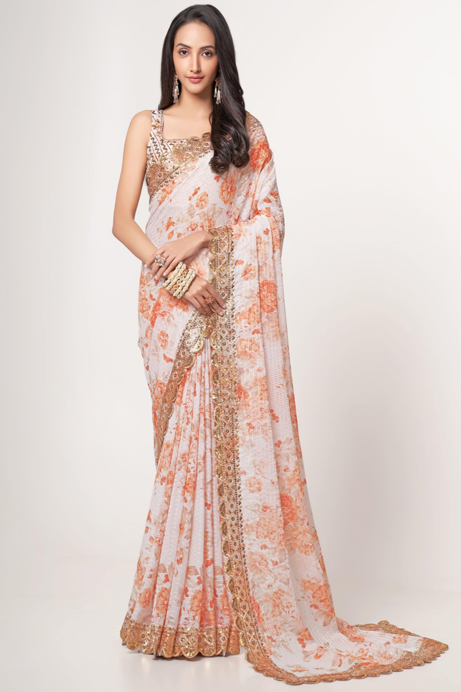 White Saree stands for purity and class – ideal for serene and sacred events.
